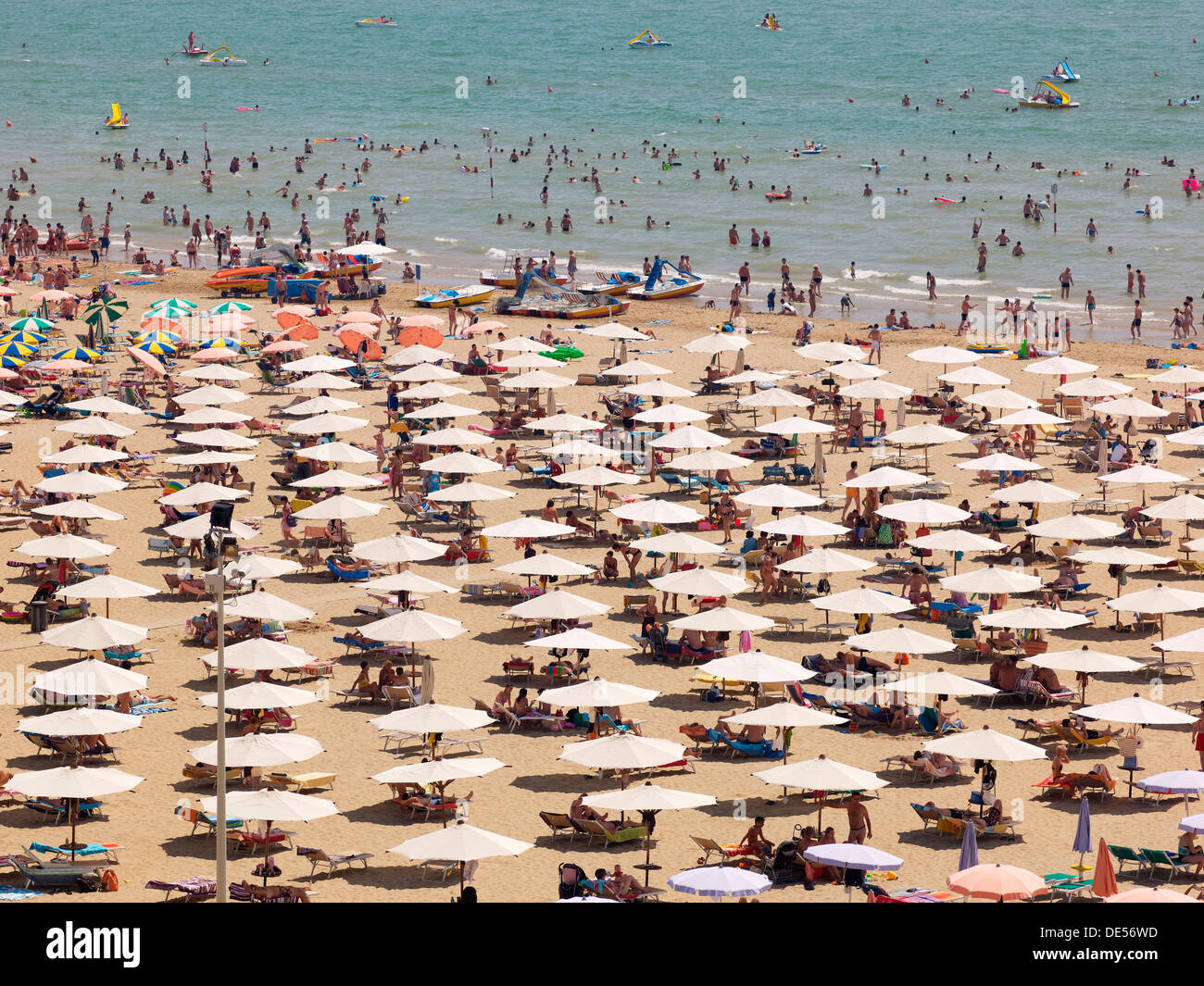 View of the beach with parasols, sun loungers and bathers, Lignano Sabbiadoro, Udine, Adriatic Coast, Italy, Europe Stock Photo