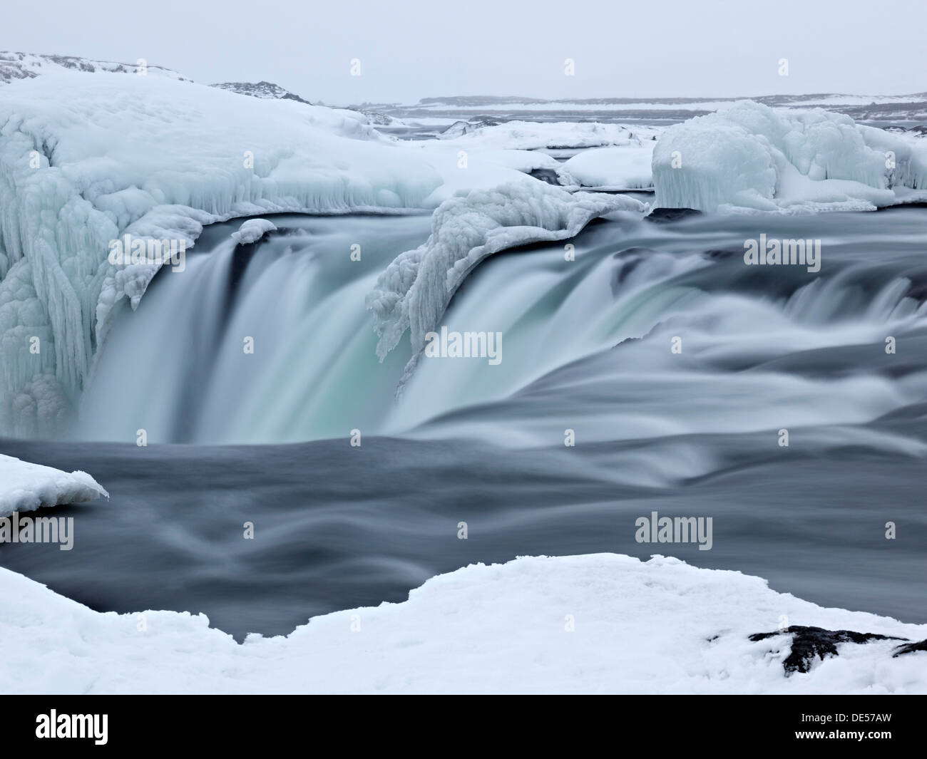 Godafoss waterfall with ice formations, Gemeinde Þingeyjarsveit, North Iceland, Iceland Stock Photo