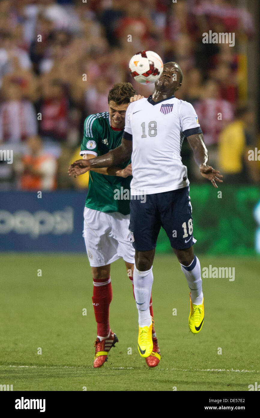 Columbus, Ohio, USA. 10th Sep, 2013. September 10, 2013: US Men's National Team forward Eddie Johnson (18) and Mexico National Team defender Hector Moreno (15) battle for the ball during the U.S. Men's National Team vs. Mexico National Team- World Cup Qualifier match at Columbus Crew Stadium - Columbus, OH. © csm/Alamy Live News Stock Photo