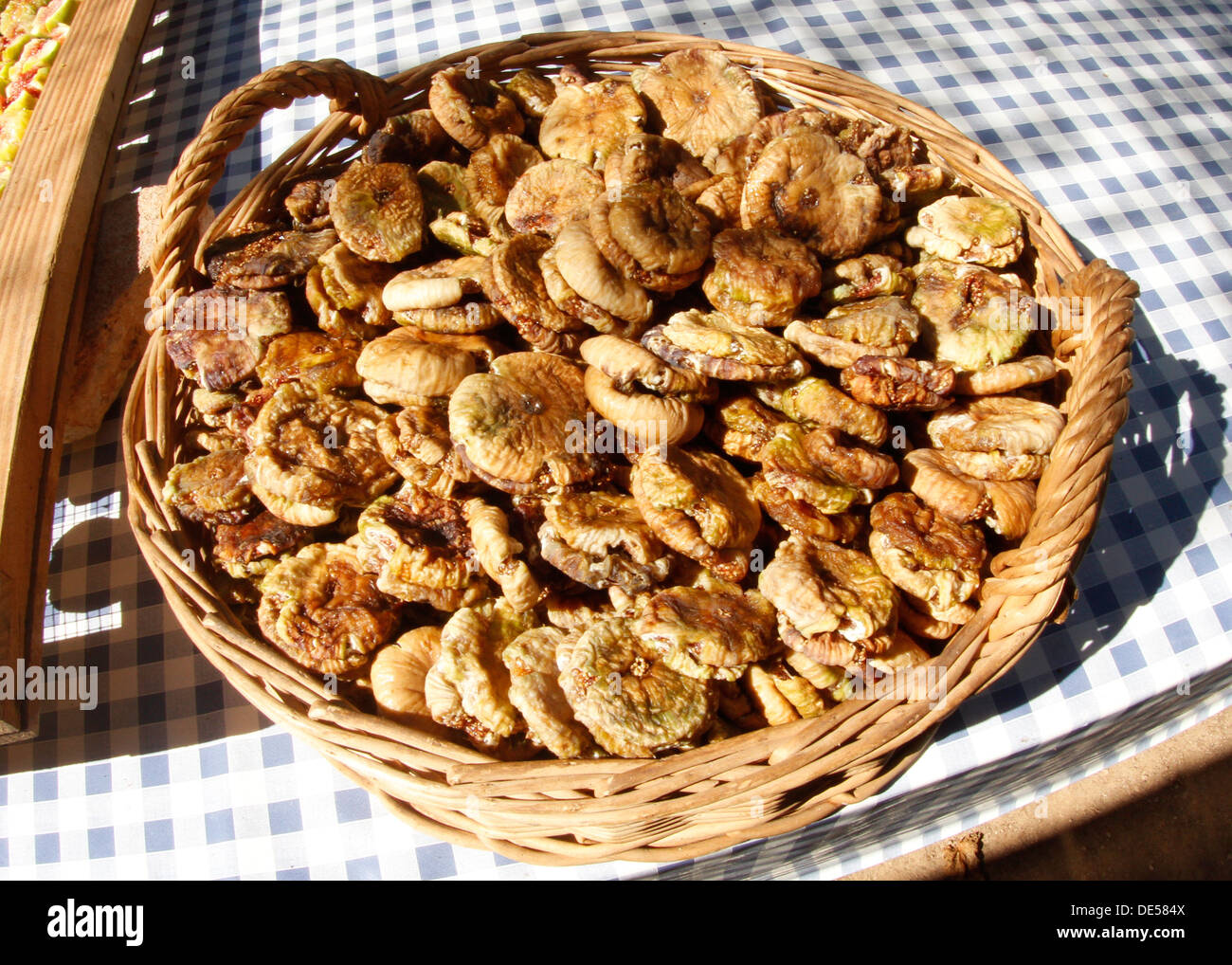 Fig fruits are dried to the sun after being cropped in a fig trees farm in the Spanish island of