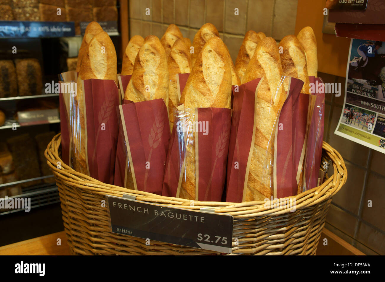 A basket of artisan French baguettes in a bakery Stock Photo Alamy