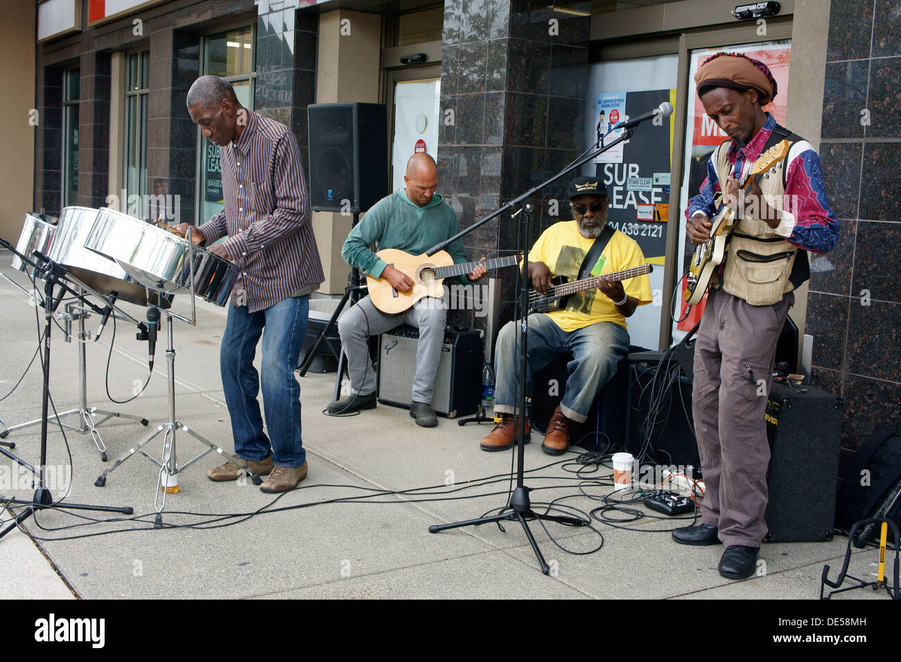 Caribbean musical band performing on the street, Vancouver, BC, Canada