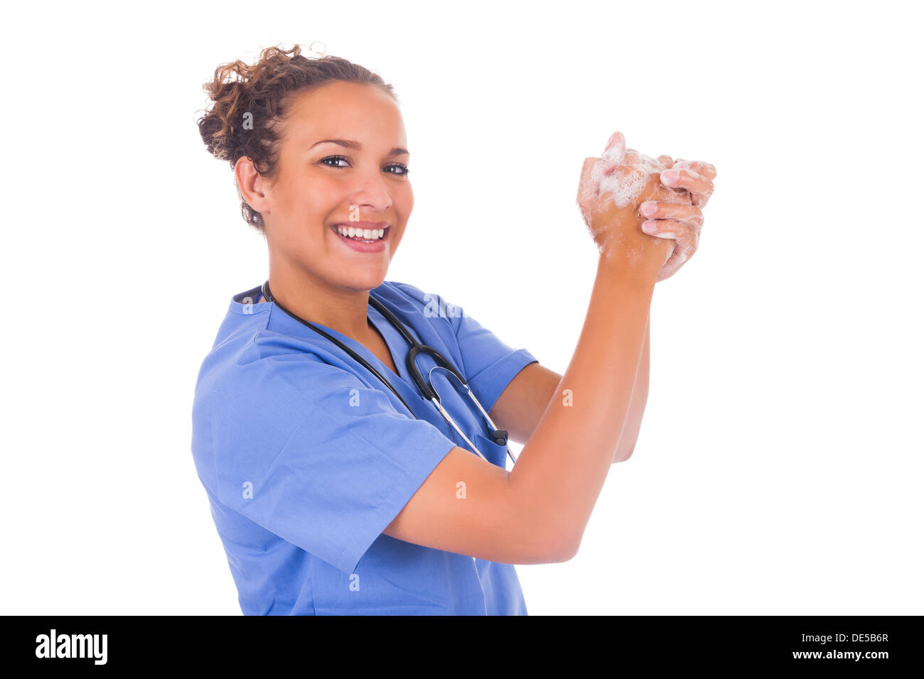 young nurse washing hands with soap isolated Stock Photo - Alamy