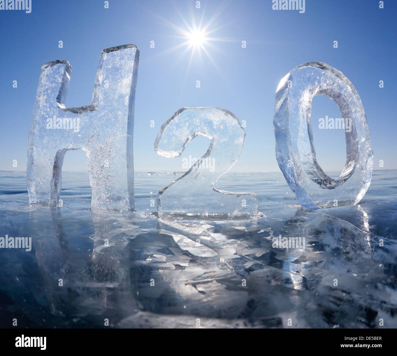 Chemical formula of water H2O made from ice on winter frozen lake Baikal  Stock Photo