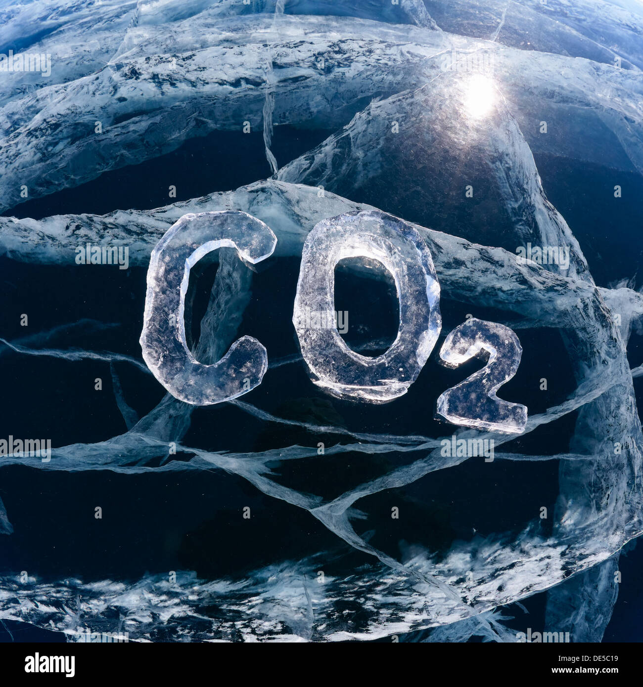 Chemical formula of greenhouse gas carbon dioxide CO2 made from ice on winter frozen lake Baikal  Stock Photo