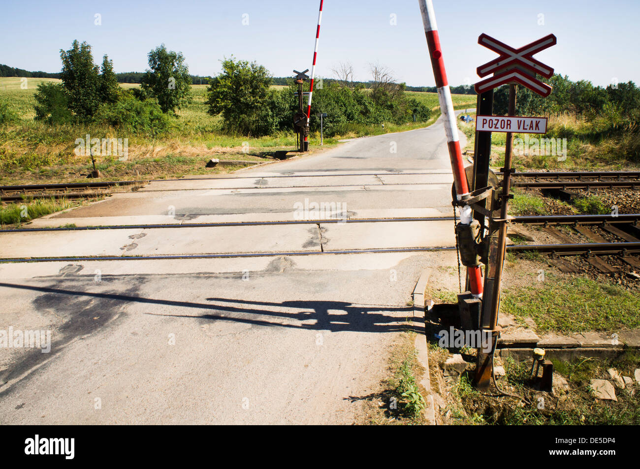 road, railway, level crossing, crossroads Stock Photo Alamy