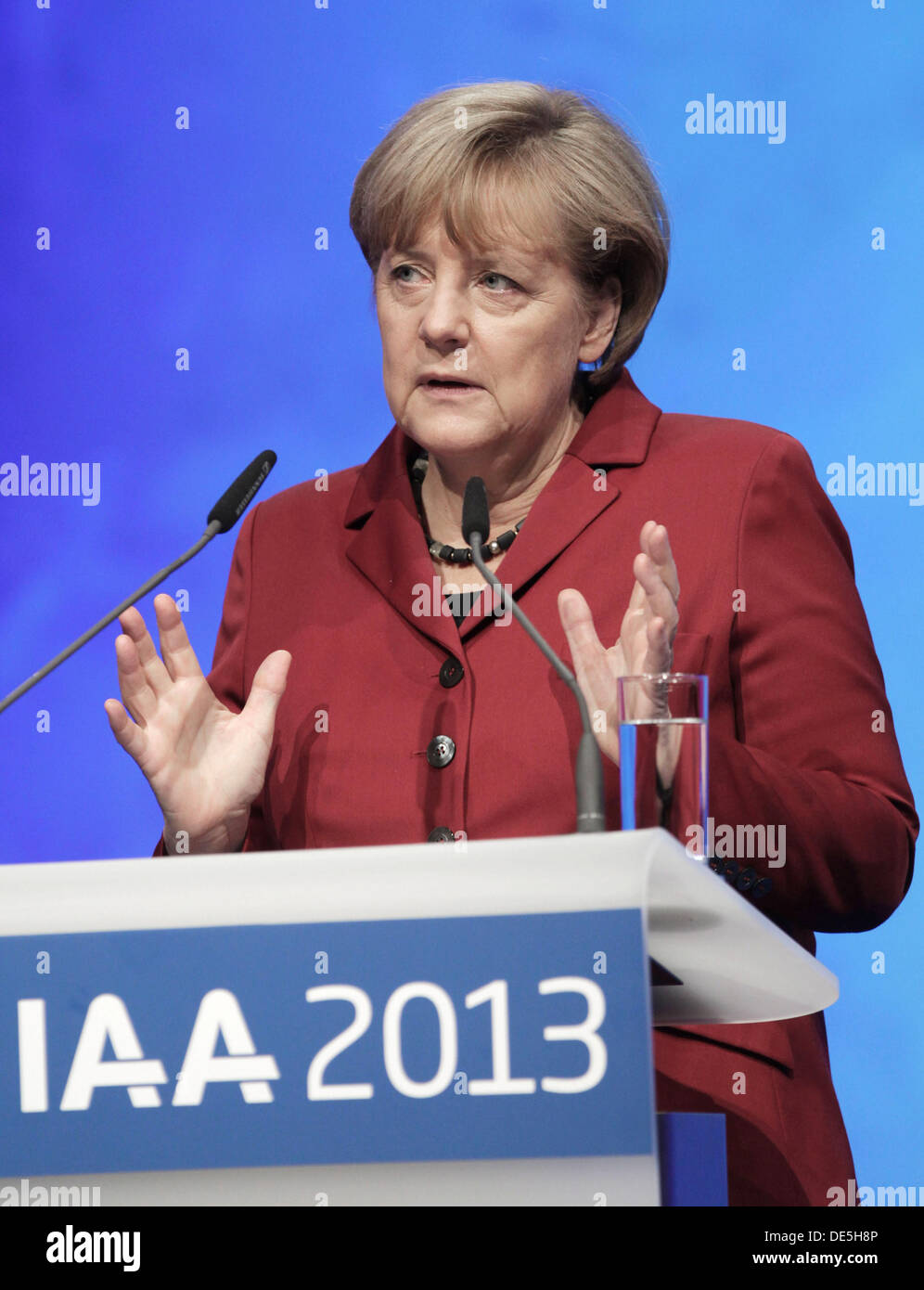 Frankfurt Main, Germany. 12th Sep, 2013. German Chancellor Angela Merkel speaks at the opening ceremony of the International Motor Show (IAA) in Frankfurt Main, Germany, 12 September 2013. Almost 1100 exhibitors from around the world present novelties at the world's largest automobile show IAA until 22 September 2013. Photo: FRANK RUMPENHORST/dpa/Alamy Live News Stock Photo
