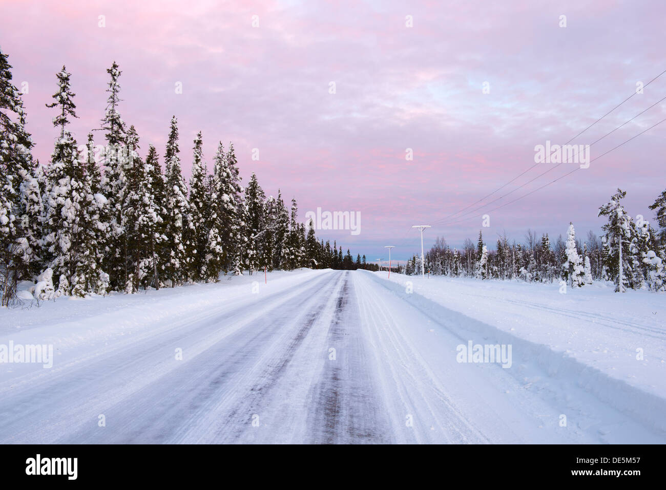 After sunset on the frozen winter roads in northern Finland Stock Photo