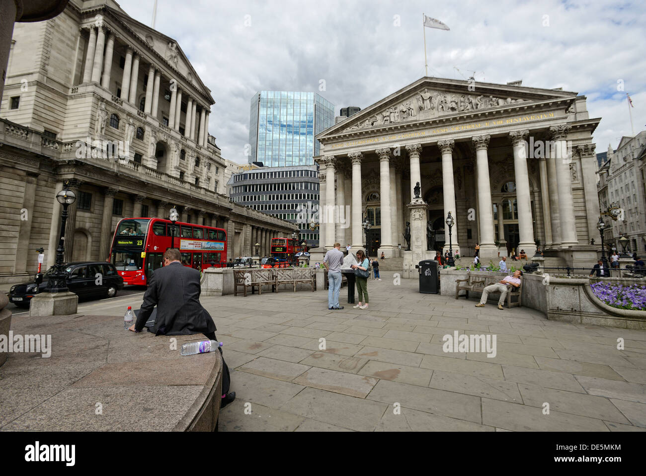 London street on a typical day in the City of London during summer, with tourists and office workers Stock Photo