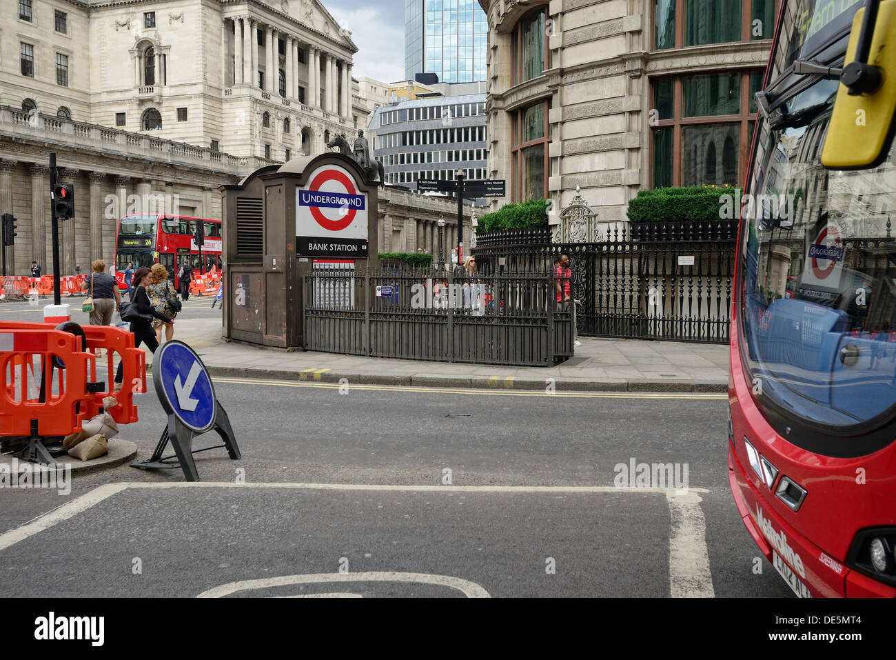 London street with the Underground roundel and roadworks Stock Photo