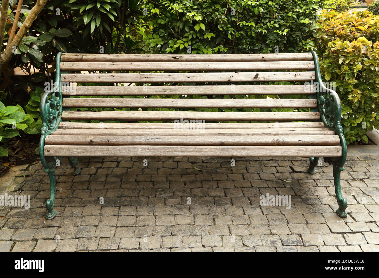 wooden park bench in the garden Stock Photo - Alamy
