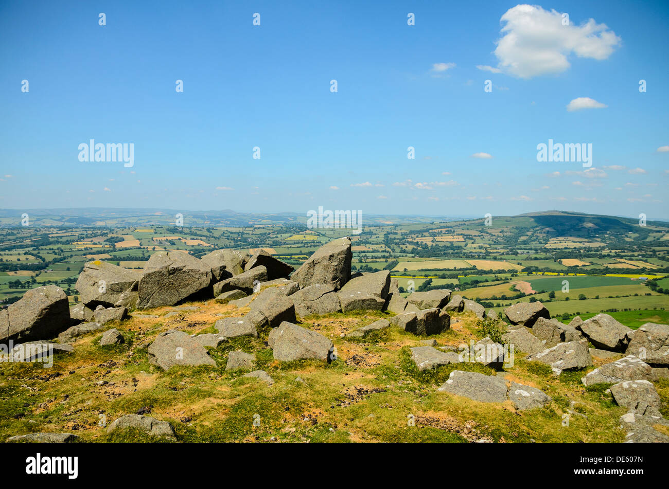 Rocks near the summit of Titterstone Clee Shropshire England, looking northwest to Brown Clee (Abdon Burf) Stock Photo