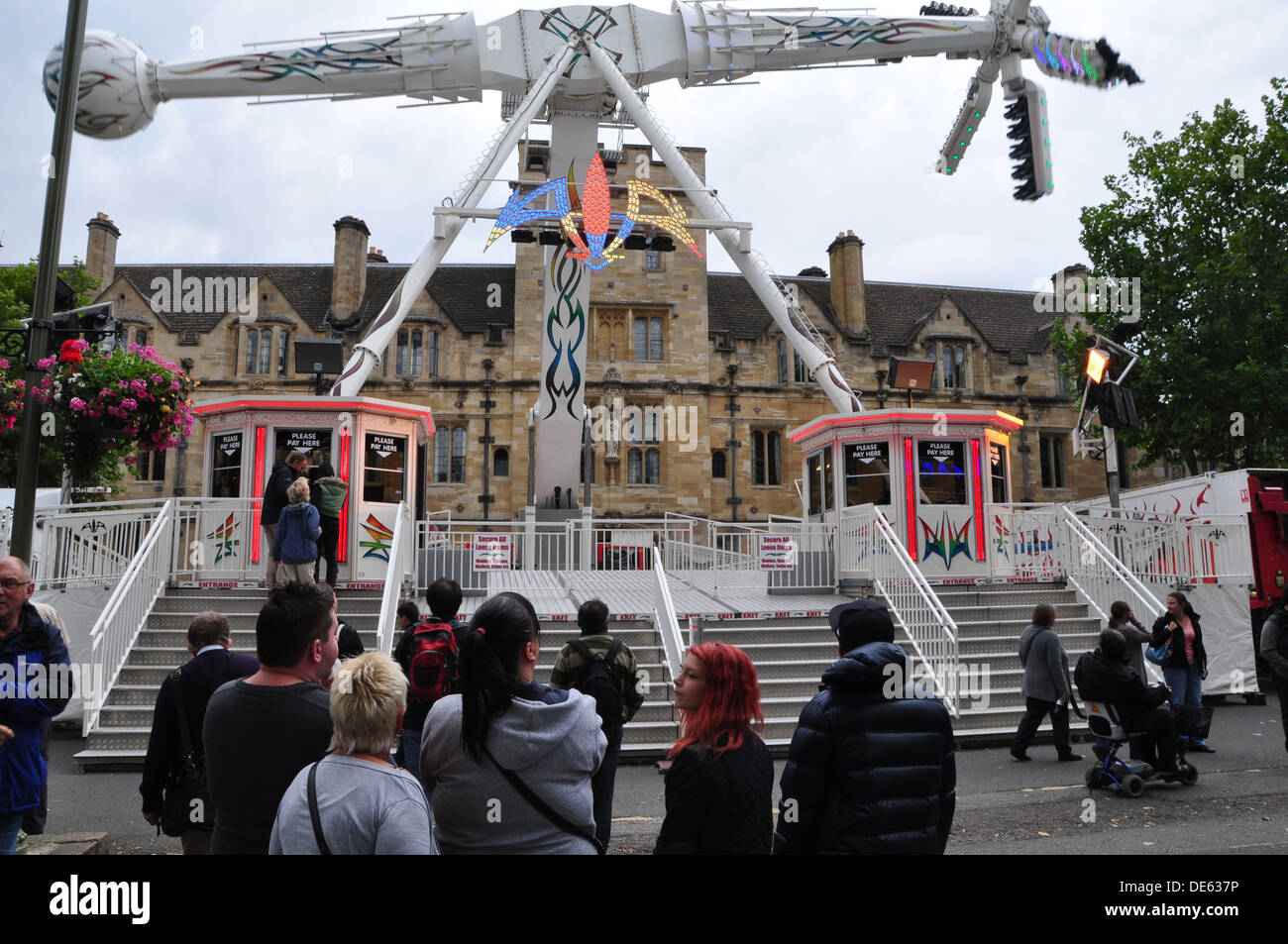 Crowd of people watching a ride at St. Giles Fair, Oxford Stock Photo