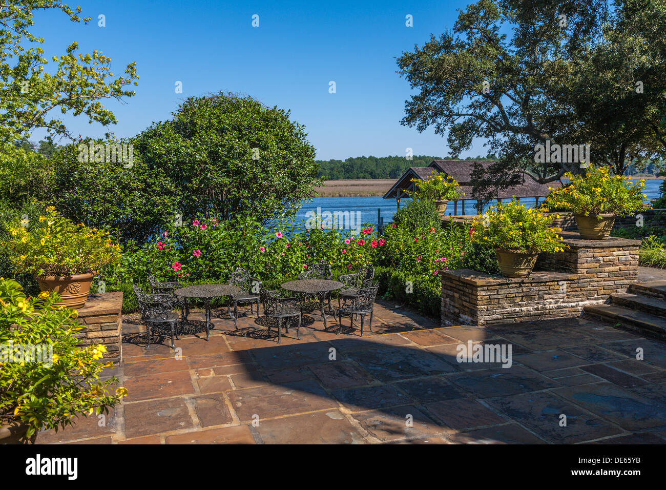 Stone patio overlooks water at Bellingrath Gardens in Mobile, Alabama