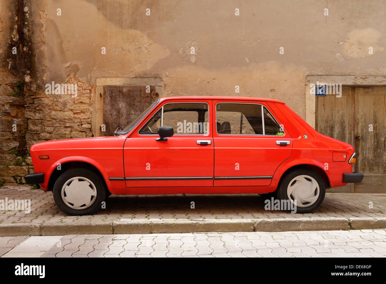 Pazin, Croatia, a red Zastava 101 GTL 55 parked on the roadside in Pazin Stock Photo