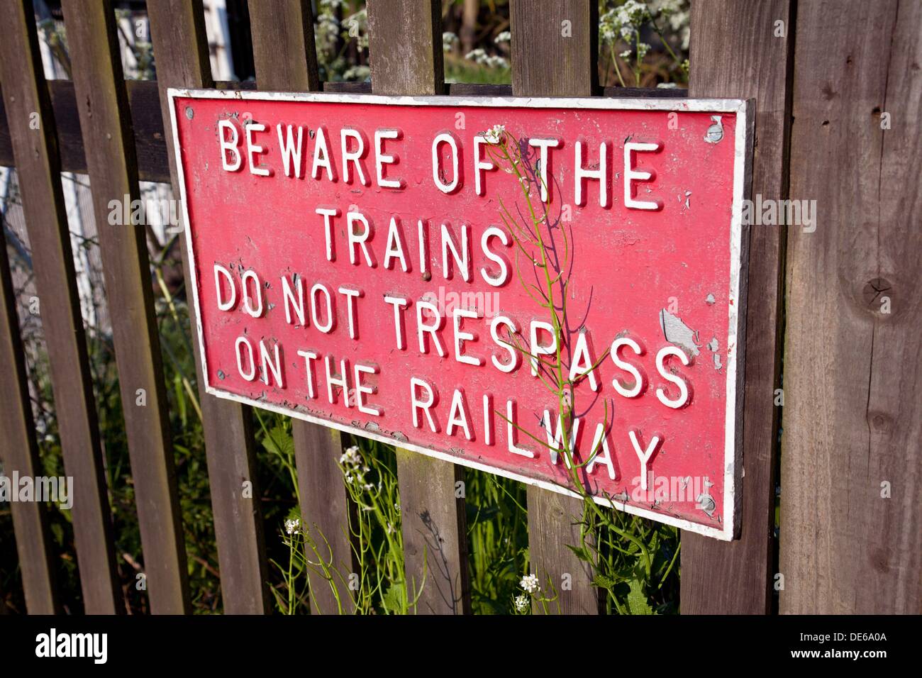 England Kent Rolvenden Station Warning notice ´Beware of the Trains Do not trespass on the Railway´ Stock Photo