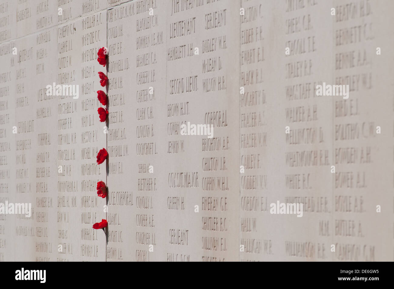 Poppies attached to monument engraved with names of the missing, Australian National War Memorial, Villers-Bretonneux, Somme Stock Photo