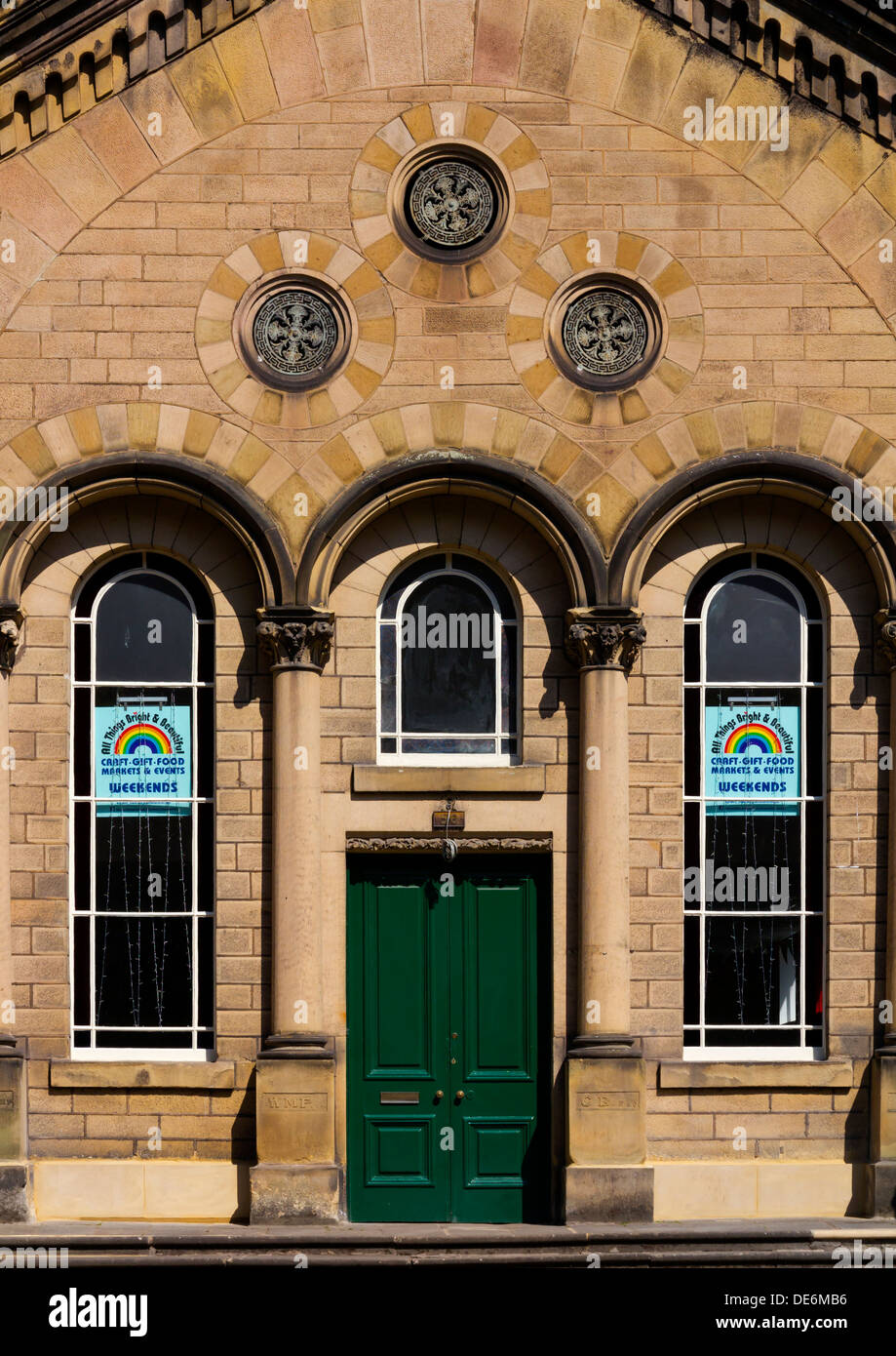 Detail of doors and windows on old methodist church used for craft fairs in Matlock Bath Derbyshire Peak District, England, UK Stock Photo