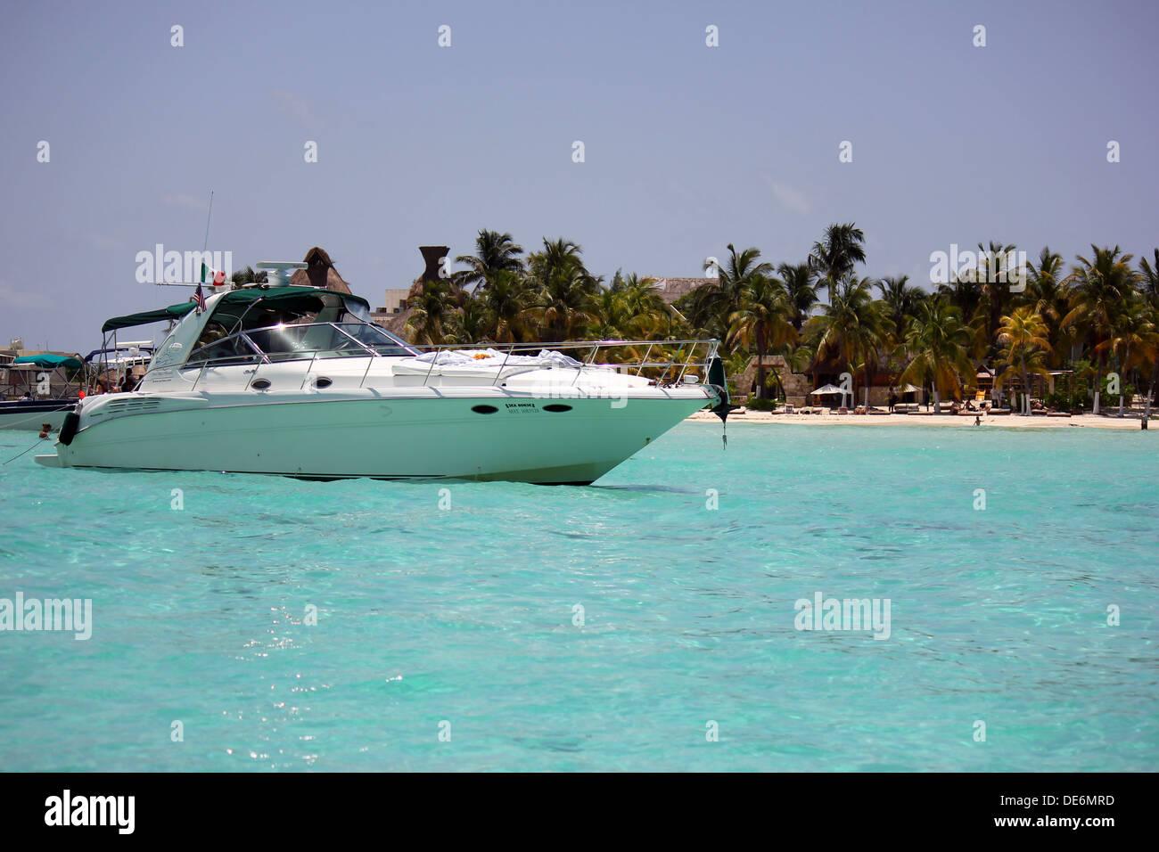 Yacht on crystal waters in Isla mujeres Stock Photo