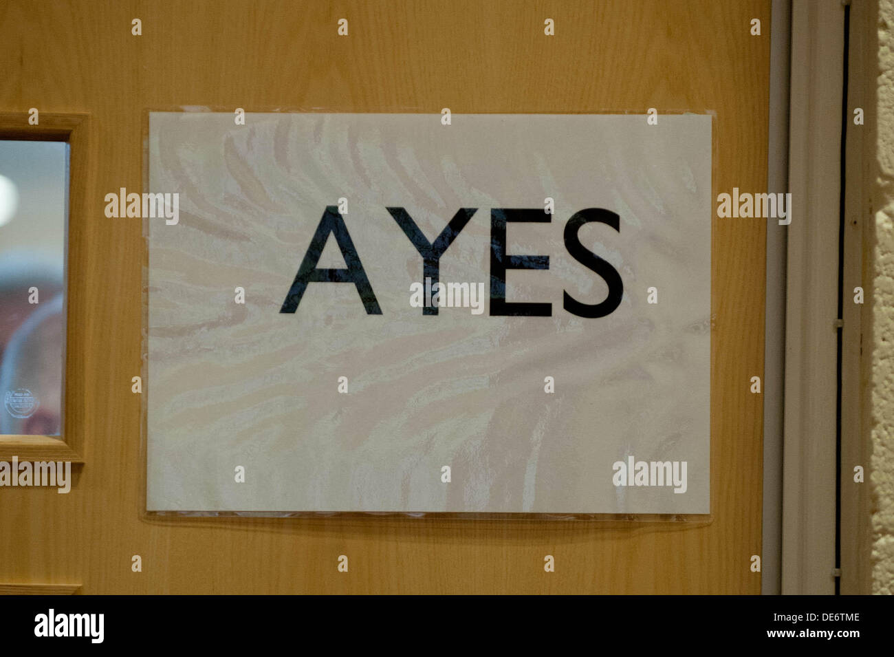 Lampeter, UK. 12th Sept, 2013.   Pictured: An 'Ayes' sign on one of the doors.  Re: Women bishops will be allowed in the Church in Wales following a landmark yes vote.Bishops within the Church tabled a bill calling for the change and which was finally accepted by its governing body after a previous vote in 2008 failed.There were huge cheers in the hall as the result was announced.In England, the issue is due to be discussed again in November. Ireland and Scotland both allow female bishops. Credit:  D Legakis/Alamy Live News Stock Photo
