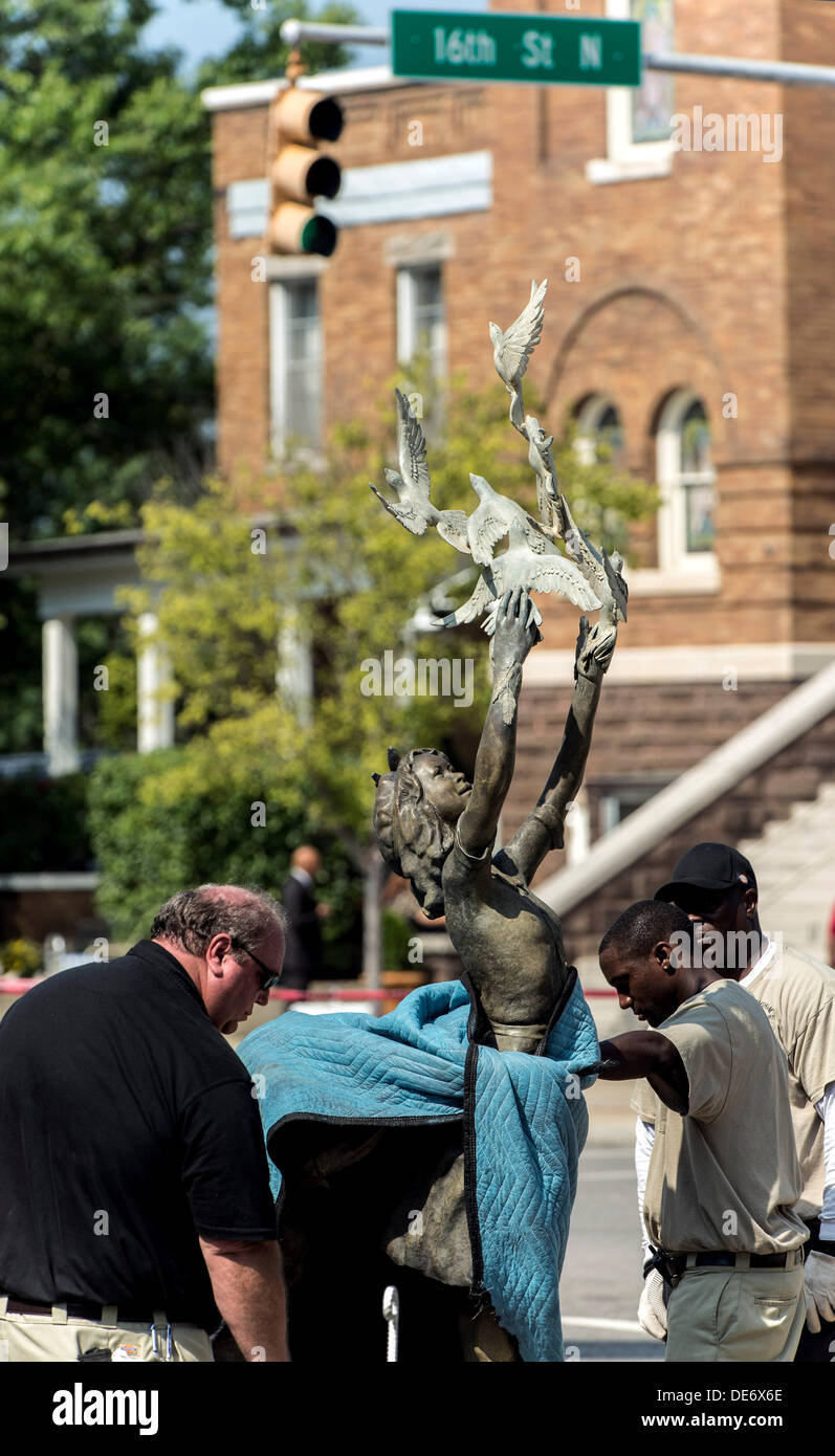 Birmingham, Alabama, USA . 12th Sep, 2013. The 3,000-pound bronze and steel sculpture which honors Addie Mae Collins, Denise McNair, Carole Robertson and Cynthia Wesley, the four girls killed in the September 15, 1963 bombing of the Sixteenth Street Baptist Church, is delivered and installed in Kelly Ingram Park, diagonally across the street from the church.  The work, entitled ''The Four Spirits,'' will be officially unveiled on Saturday, the 50th anniversary of the bombing.(Credit Image: © Brian Cahn/ZUMAPRESS.com) Credit:  ZUMA Press, Inc./Alamy Live News Stock Photo