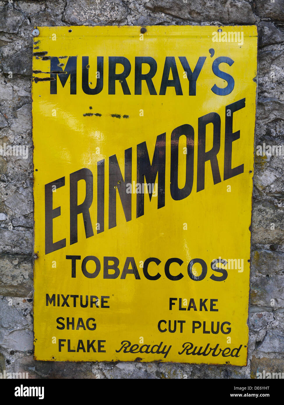 Vintage Yellow Murrays Tobaccos Product Sign taken at the Crich Tramway Museum in Derbyshire, United Kingdom Stock Photo
