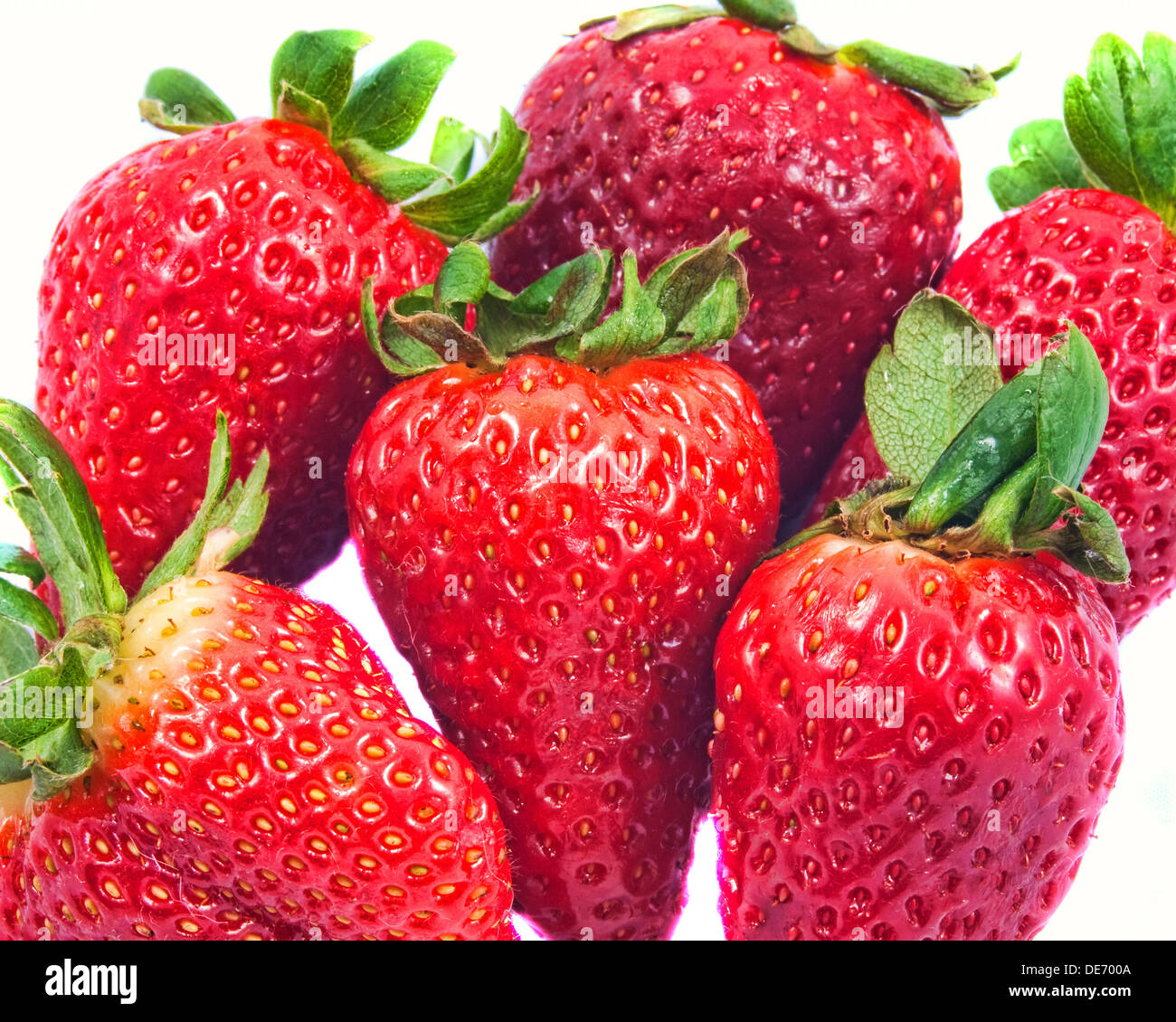 ripe red strawberries on a white background Stock Photo