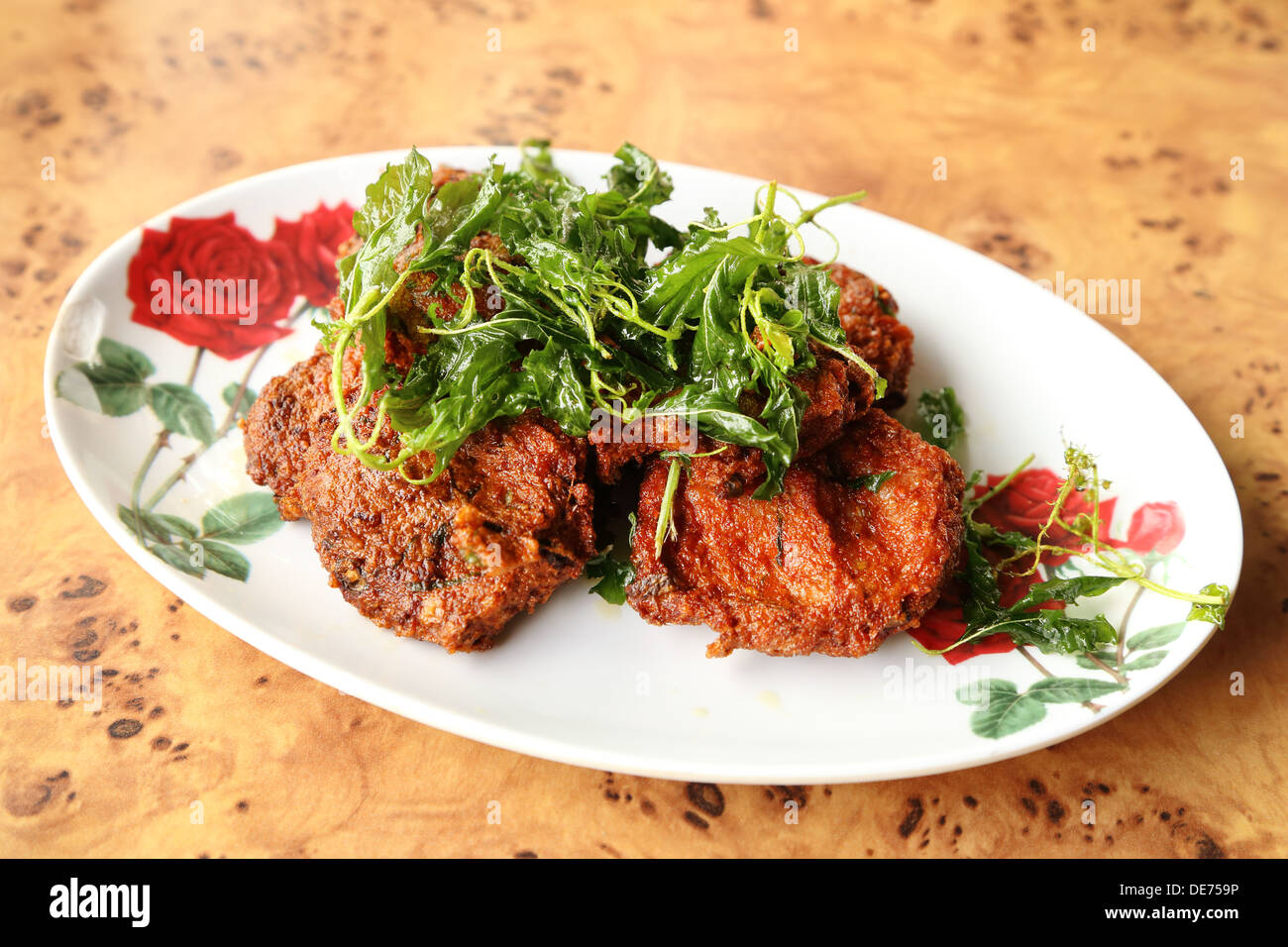 plate of Deep-fried curried fish patties Stock Photo