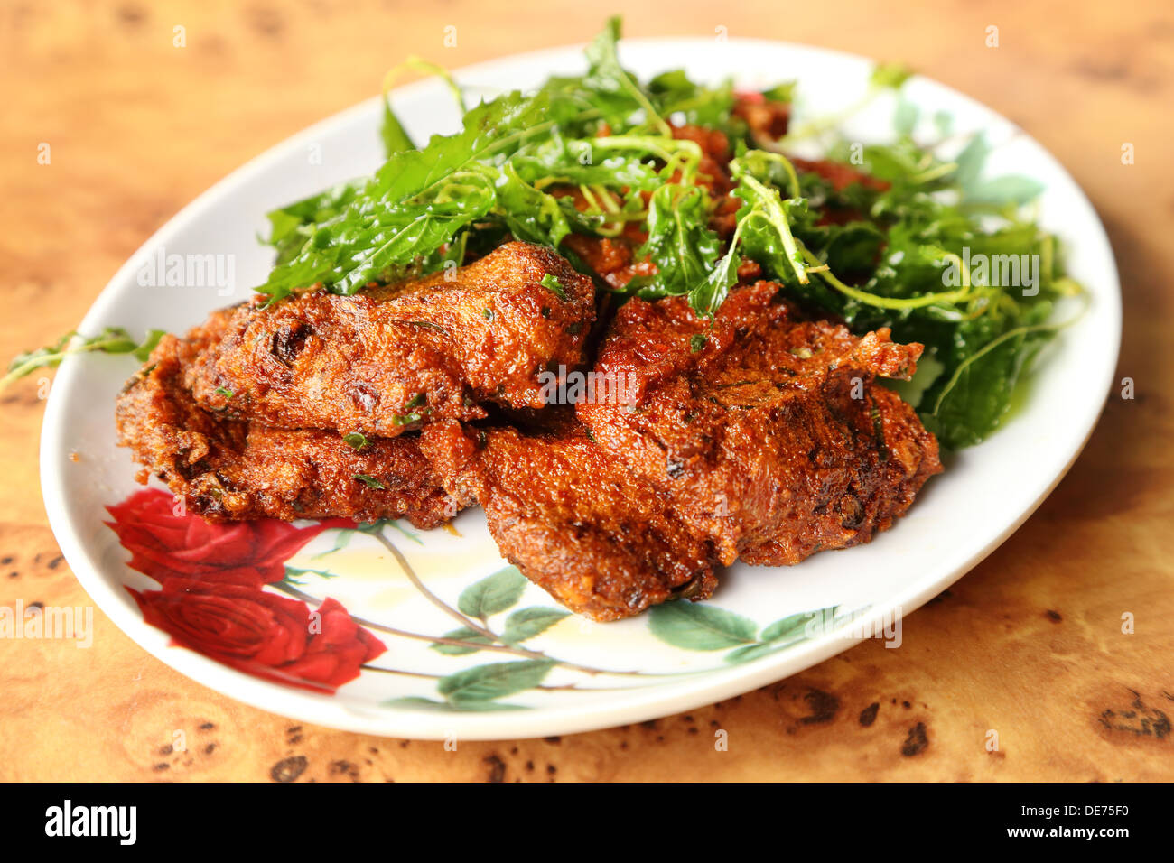 plate of Deep-fried curried fish patties Stock Photo