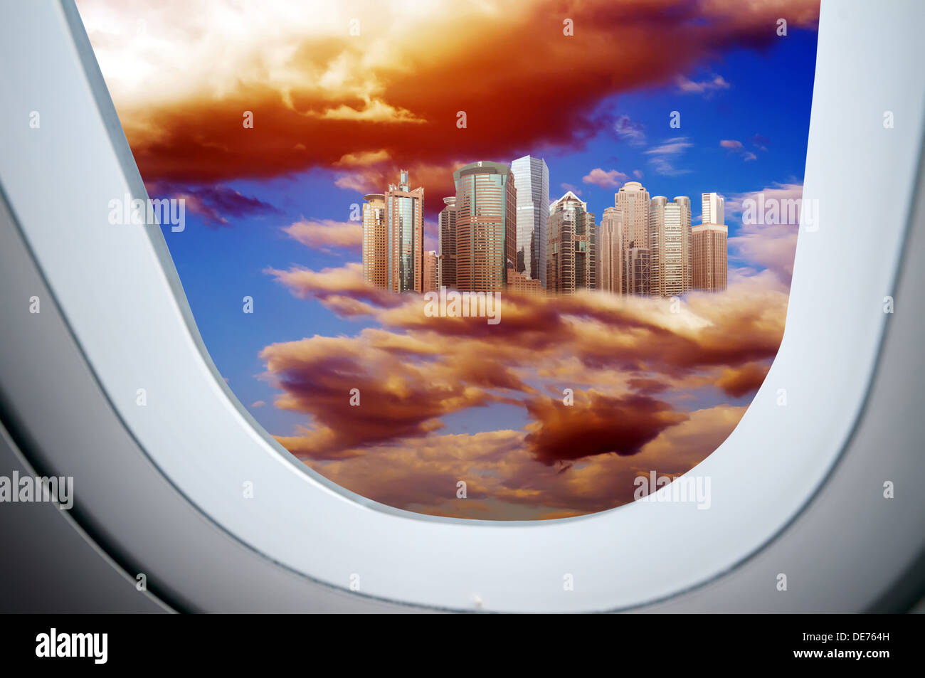 Through the aircraft windows, Higher than the clouds of skyscrapers ...