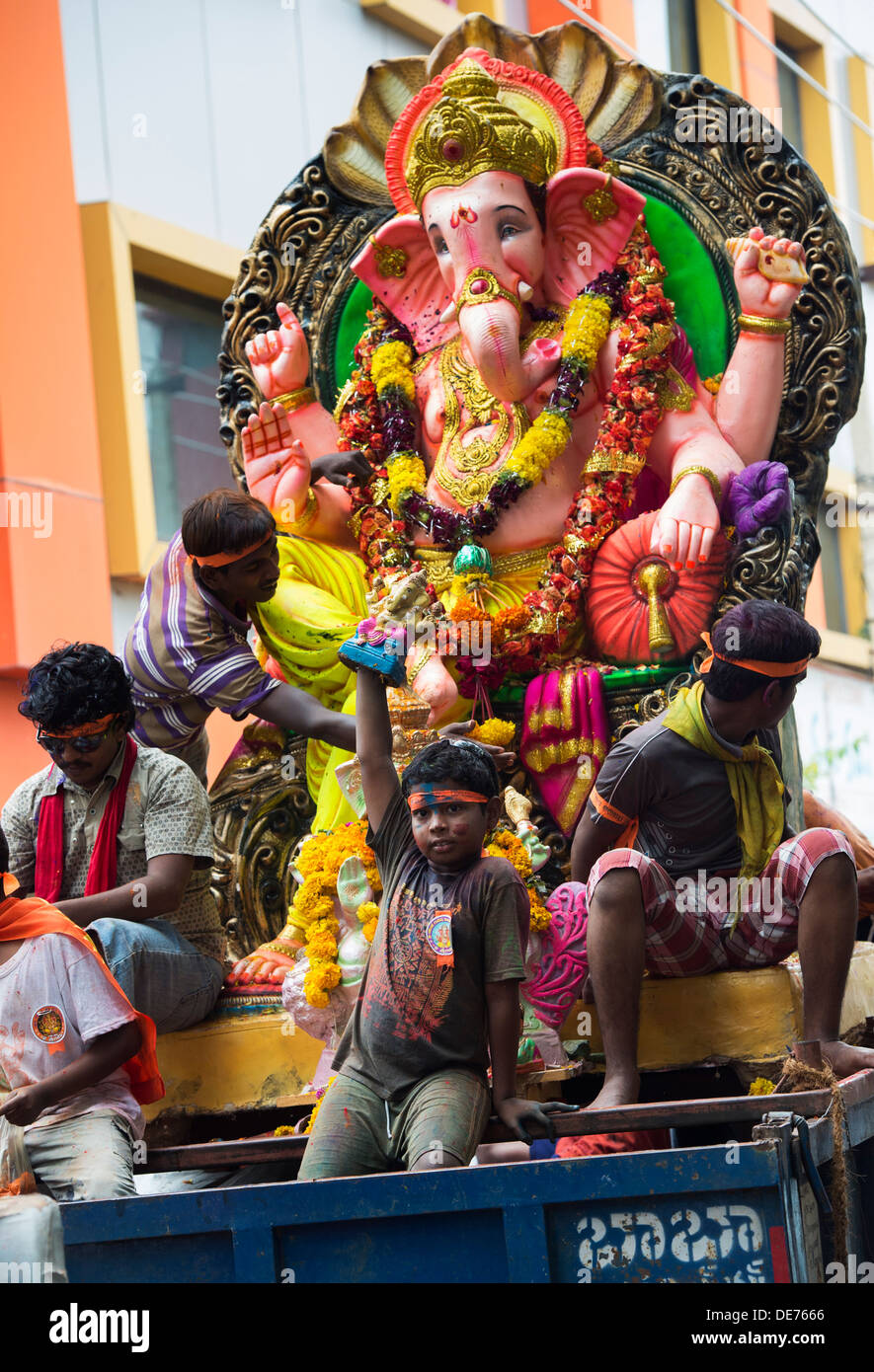 Indian people worshiping Lord Ganesha statue. Ganesha Chaturthi Stock