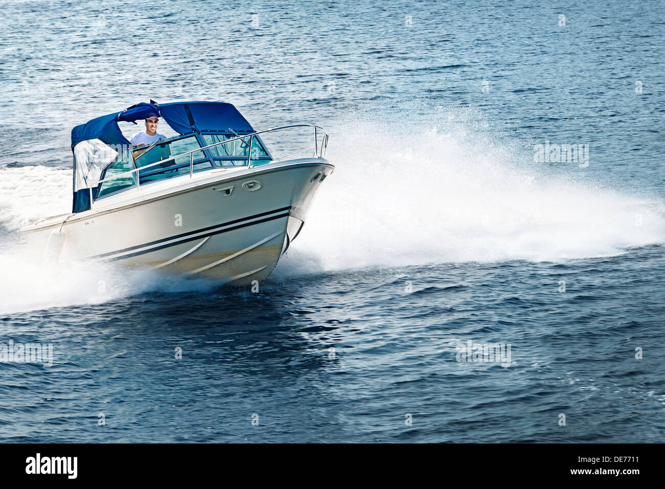 Man On Motorboat High Resolution Stock Photography and Images - Alamy
