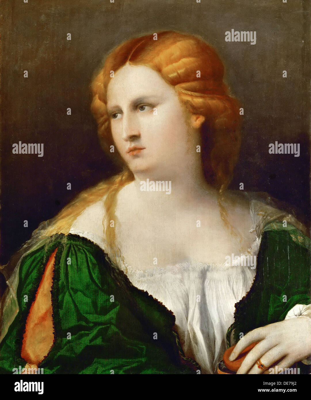 Young woman in a green dress, a box in her hand, ca 1514. Artist: Palma il Vecchio, Jacopo, the Elder (1480-1528) Stock Photo