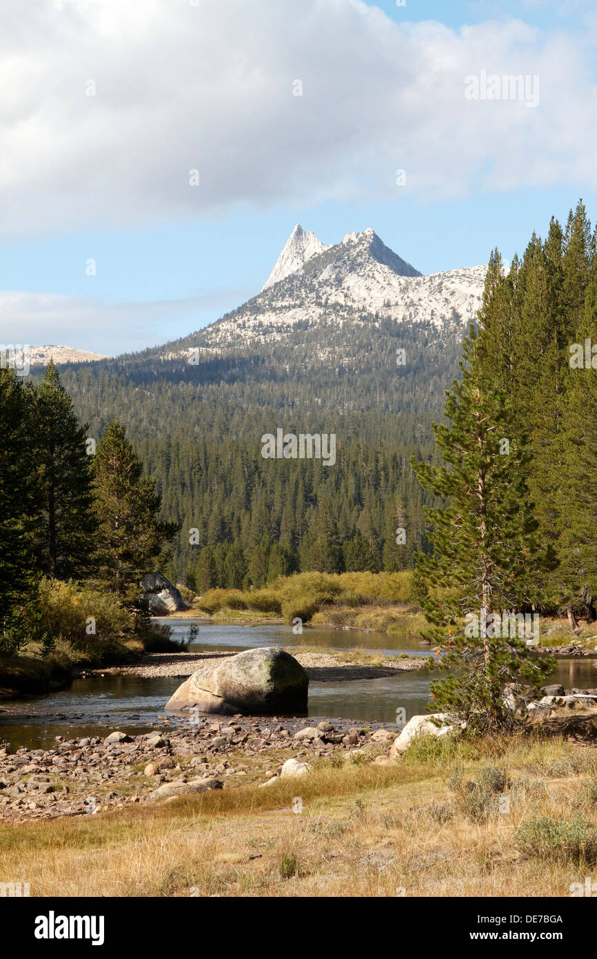 The Tuolumne river flowing through Tuolumne Meadows with Cathedral peak