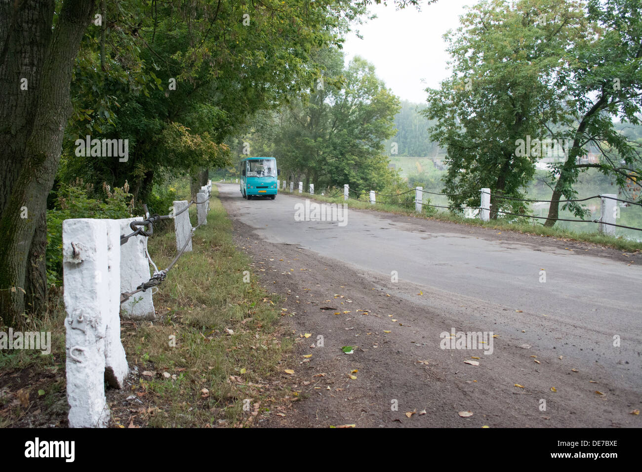 A passenger bus by the lakeside in rural Ukraine Stock Photo