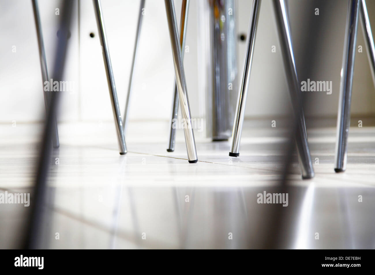 Closeup crop of chrome chair legs Stock Photo Alamy