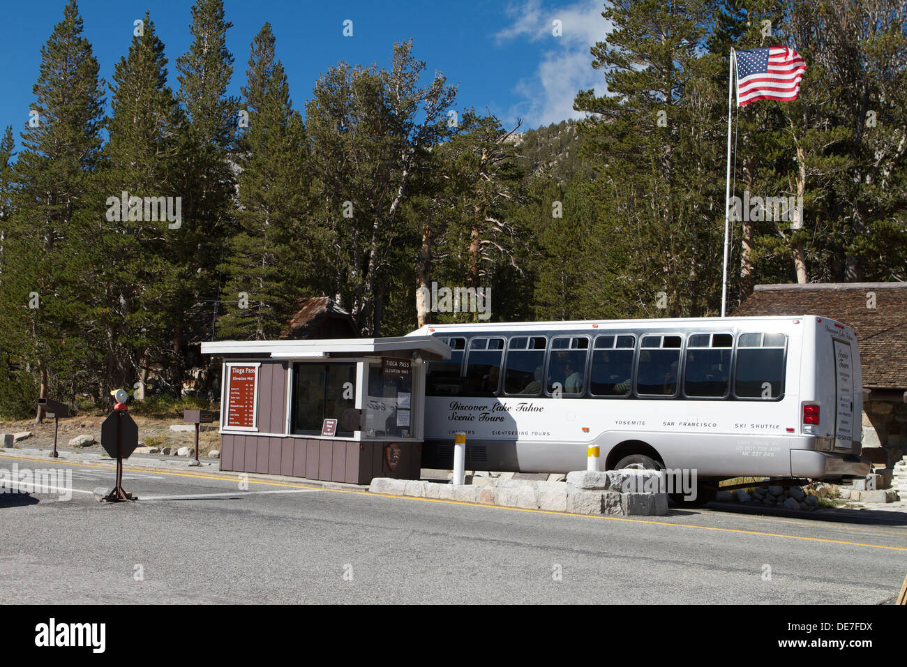 A tour bus at the Eastern entrance to Yosemite National Park on the