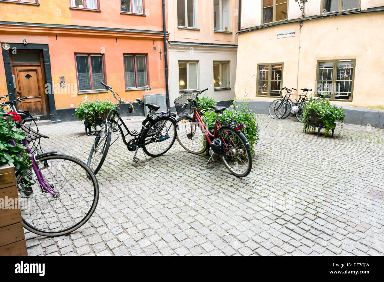Bicycles in a courtyard in Stockholm's Gamla Stan Stock Photo