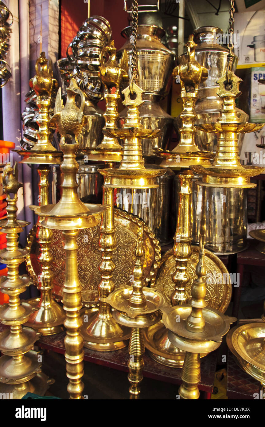 Brass oil lamps at a shop in Kollam, Kerala, India Stock Photo