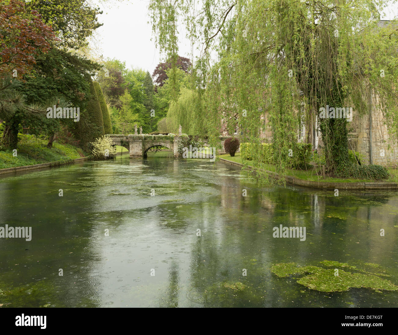 Netherlands, View of moat and bridge in rain Stock Photo