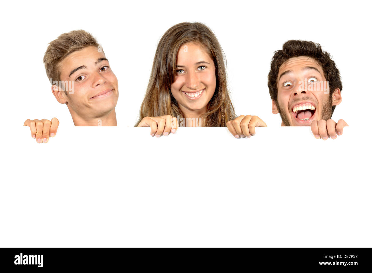 Group of teenagers with a white board isolated in white Stock Photo - Alamy