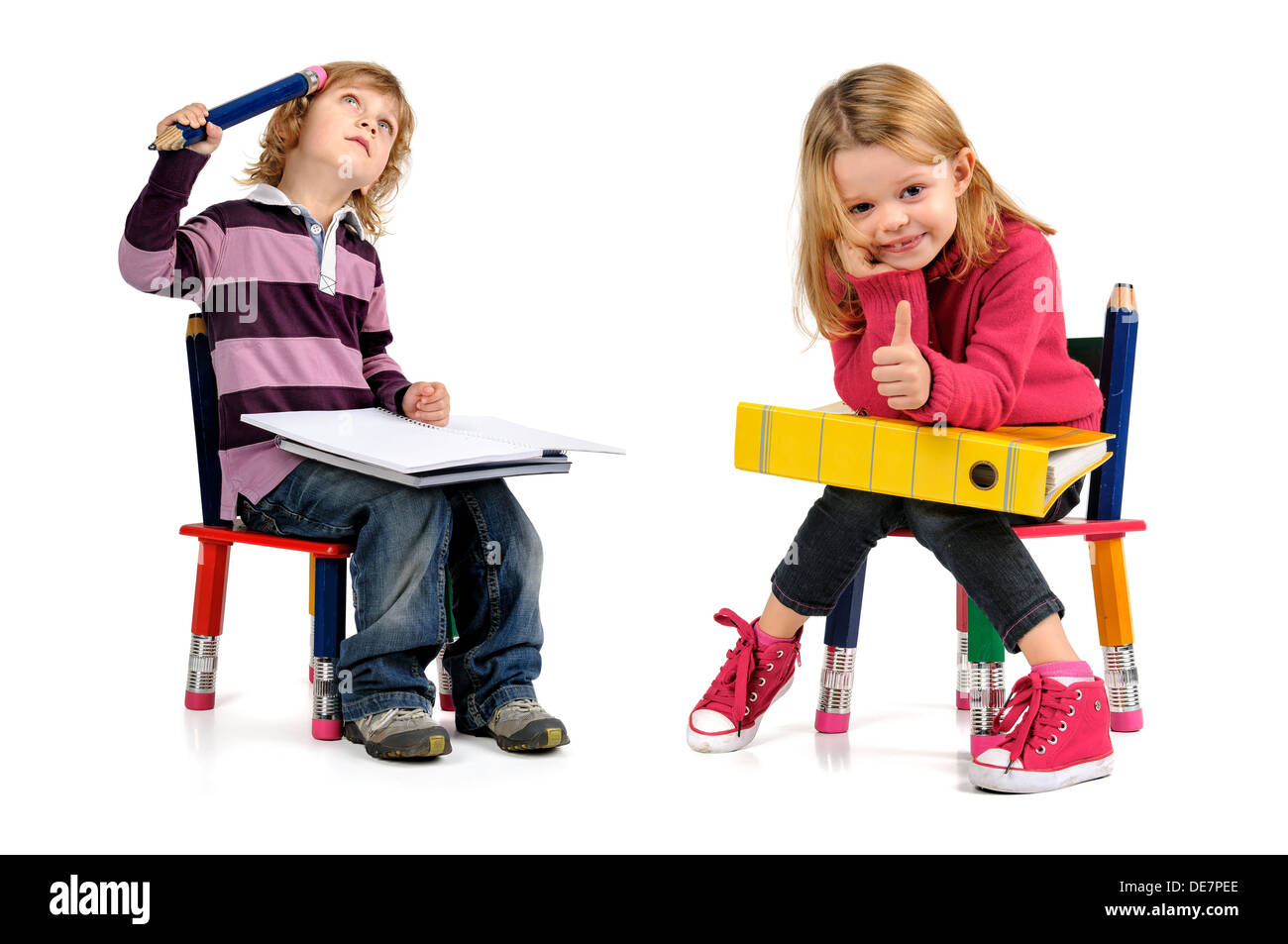 Young students seated in a chair isolated in white Stock Photo Alamy