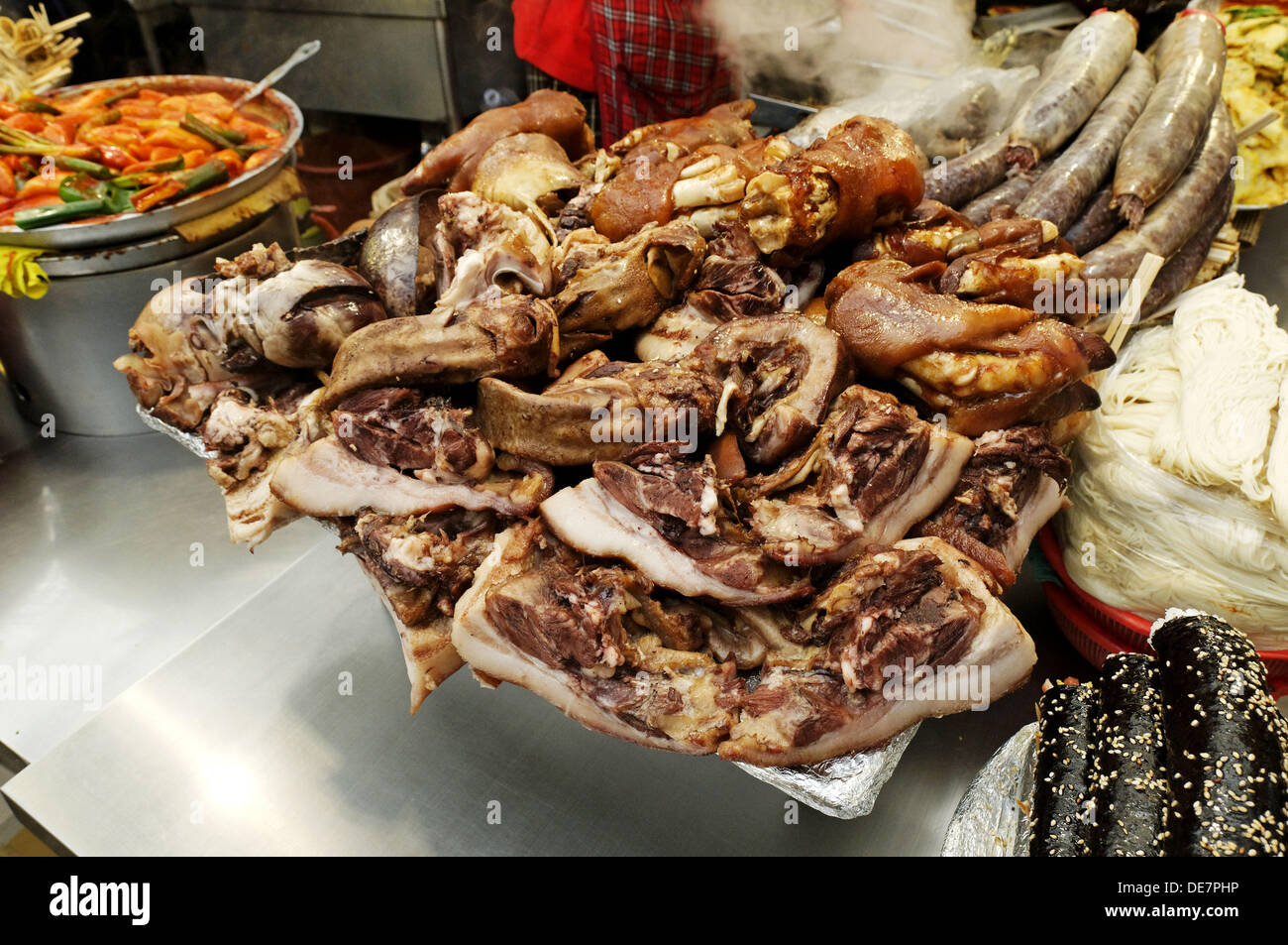 korean food, cooked pork meat and sausage, market in Seoul, South Korea