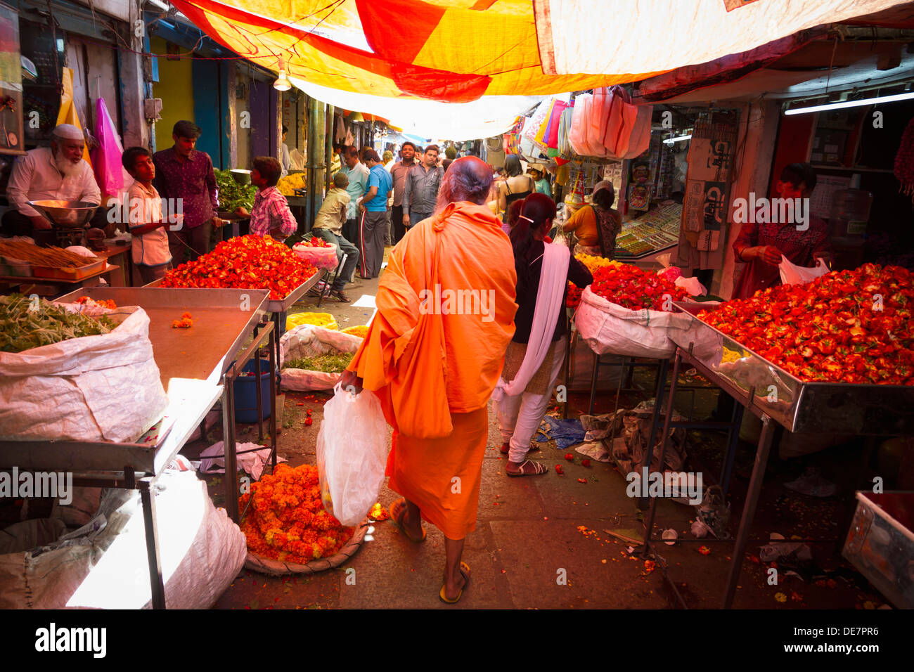 India, Mysore, Monk shopping at flower market Stock Photo Alamy