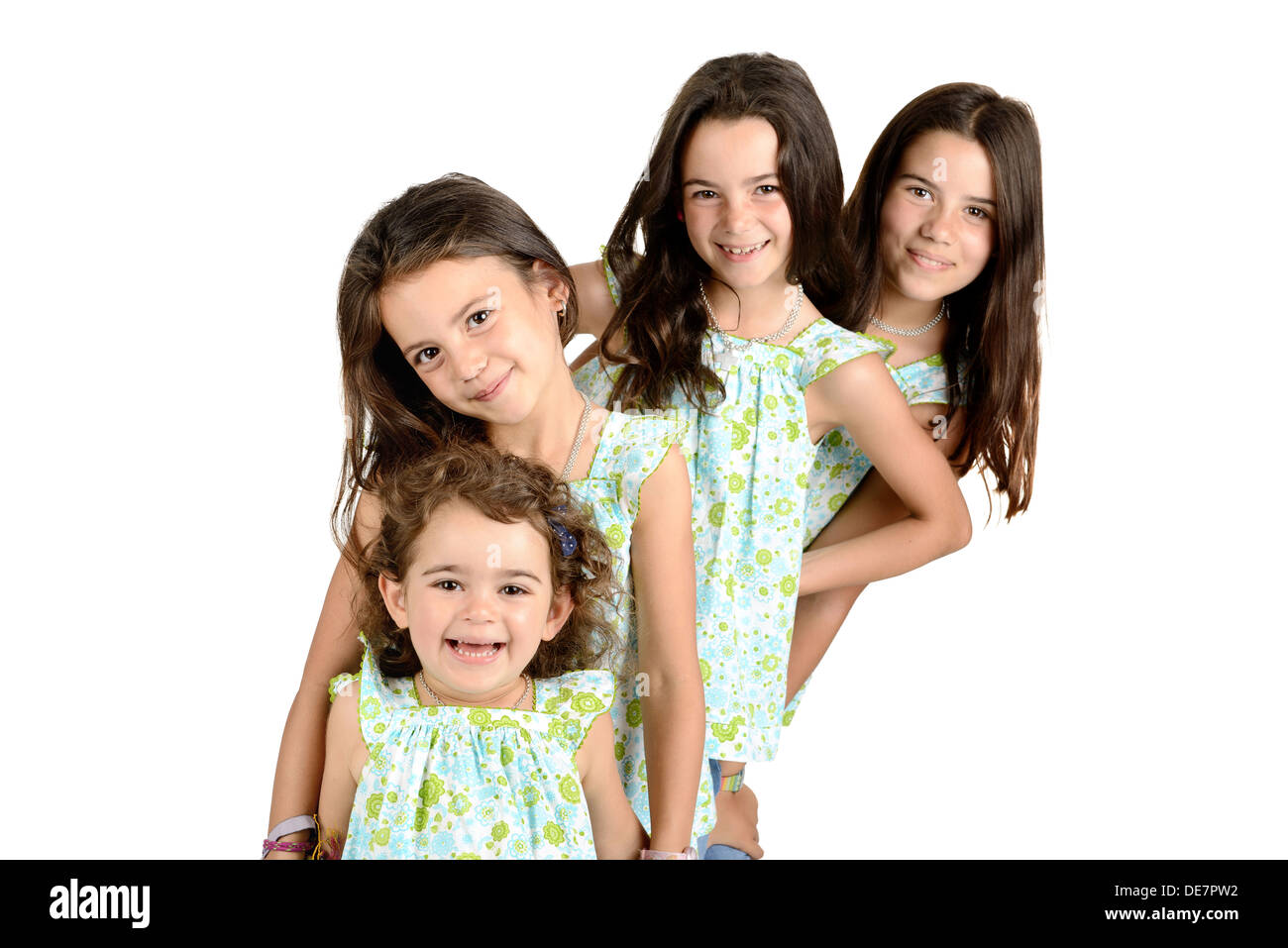 Group of young girls posing isolated Stock Photo - Alamy
