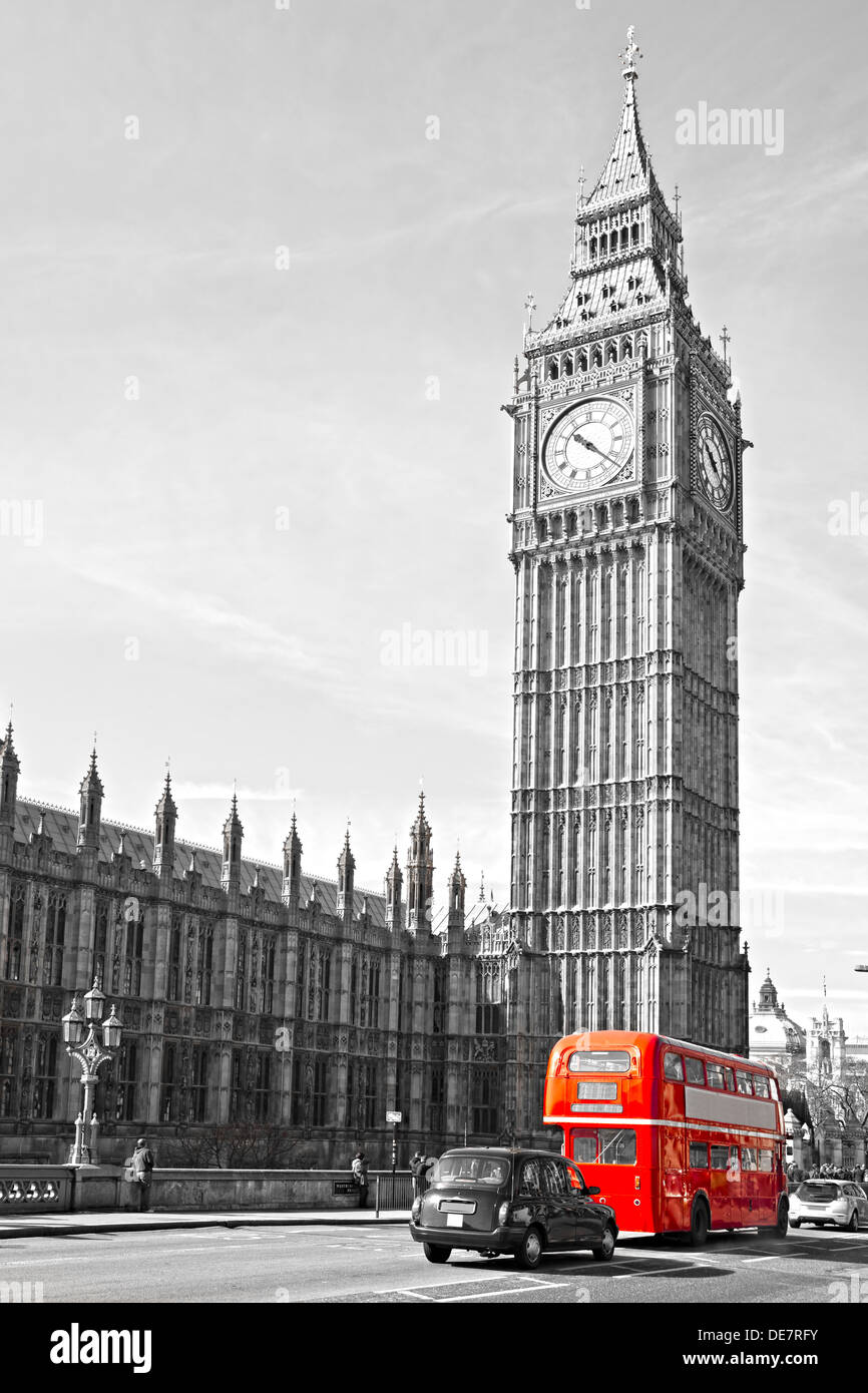 The Big Ben and a red doubledecker bus in london, UK. Stock Photo