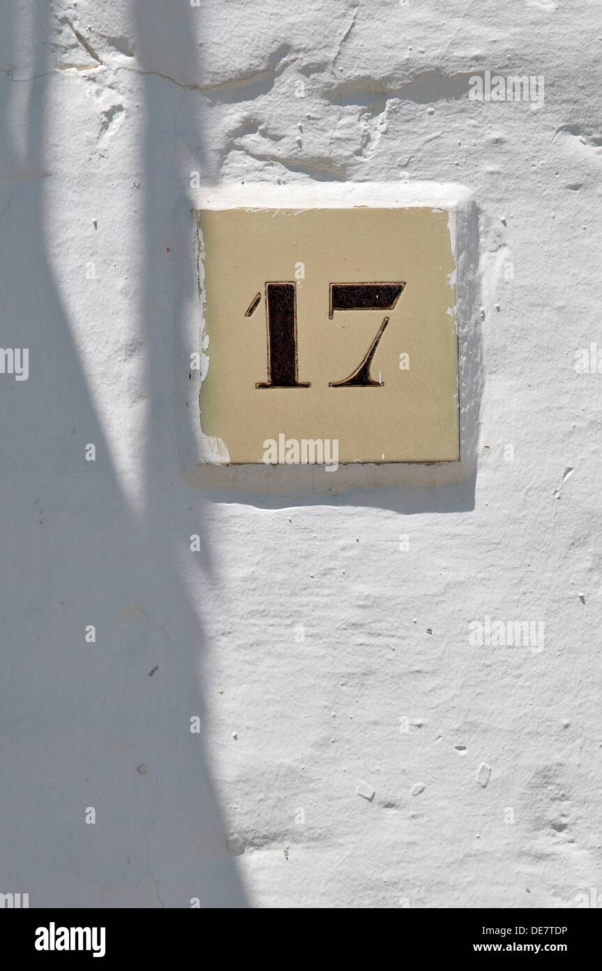 Ceramic tile with number seventeen, Azulejo de cerámica con el número 17  Stock Photo - Alamy