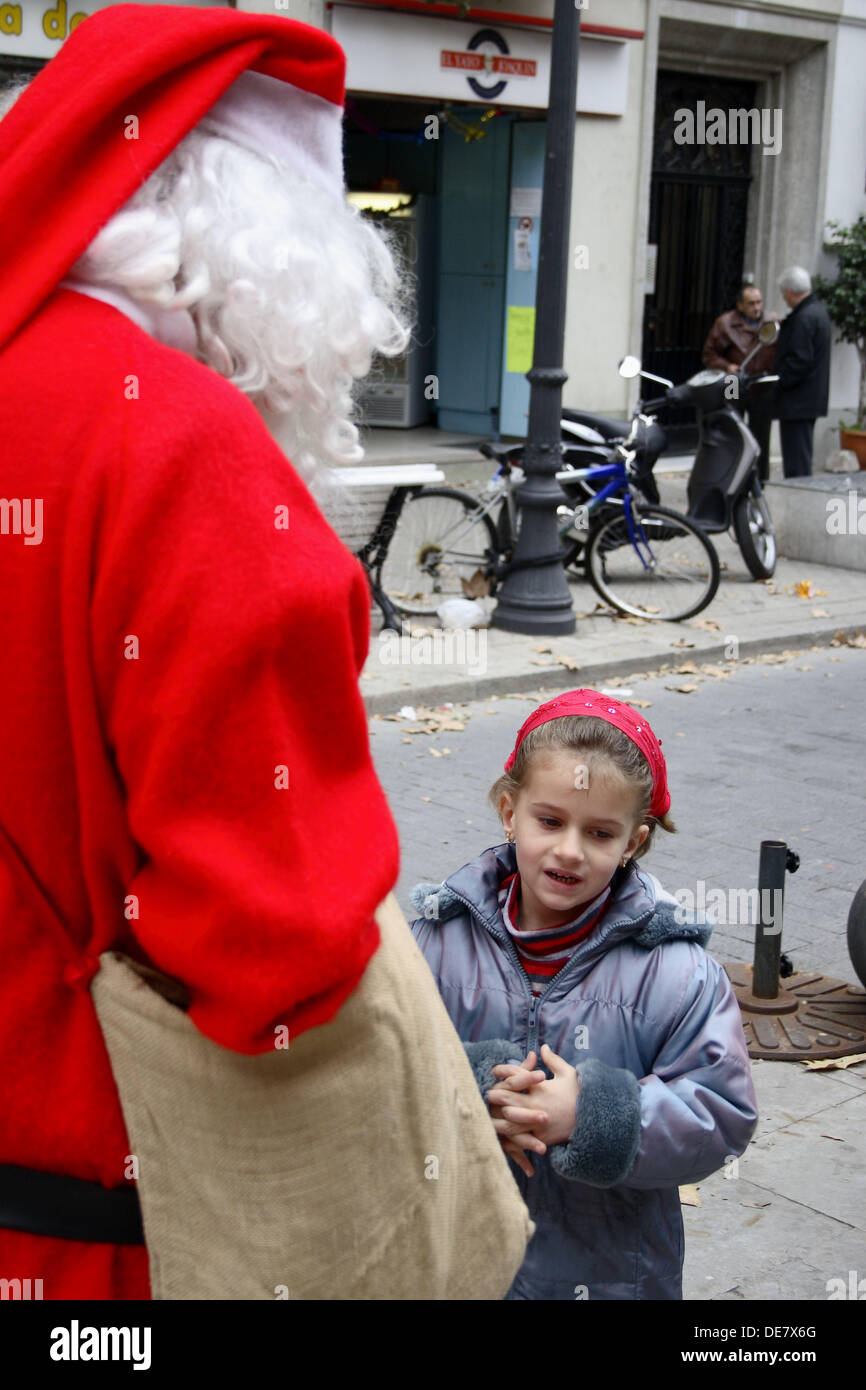 5 year old girl with Santa Claus Stock Photo Alamy