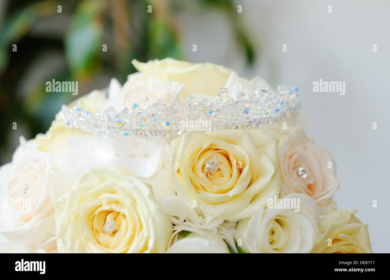 Brides bunch of yellow roses with closeup of tiara showing detail Stock Photo