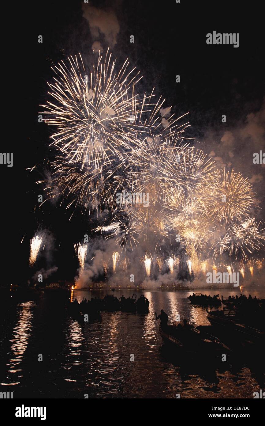 Fireworks on the water during Festa del Redentore celebrations in Saint Mark´s basin, Venice, Italy, Europe Stock Photo